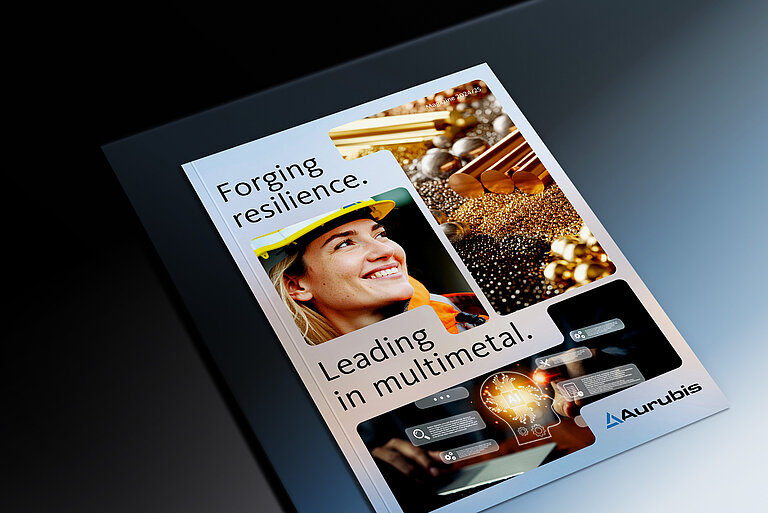 Cover page of Aurubis magazine on a table