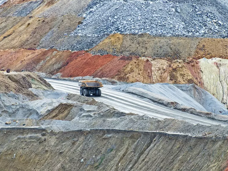 Copper mining in Montana, a yellow lorry in the centre of the picture